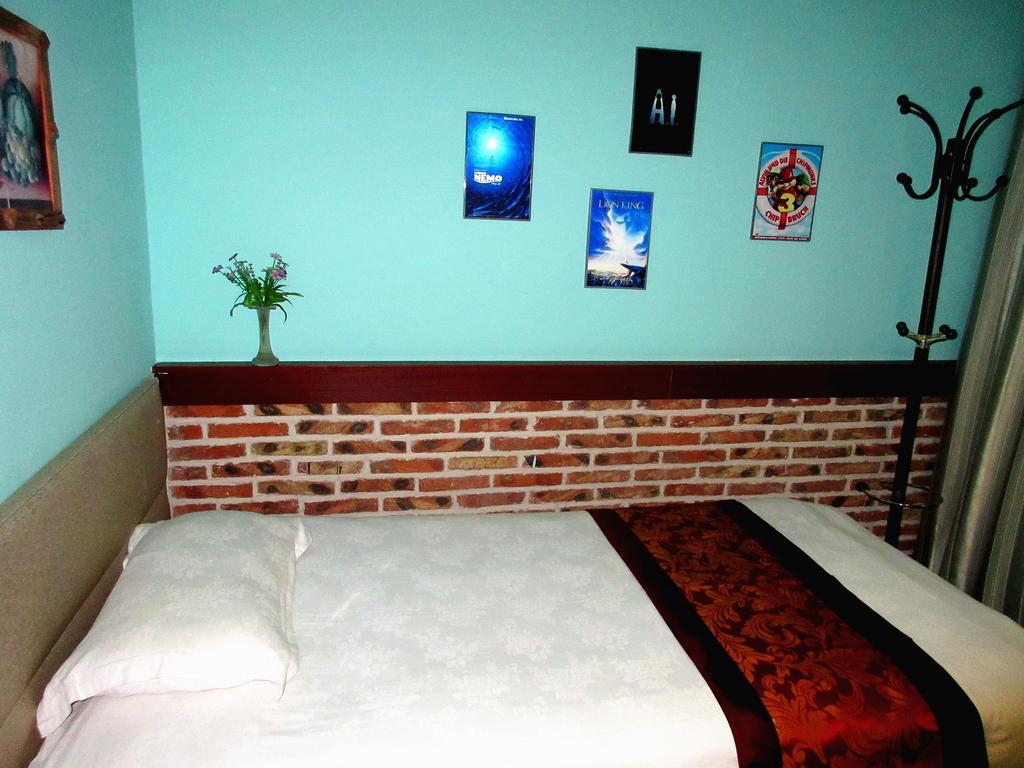 25°C Four Season Youth Hostel Циндао Номер фото