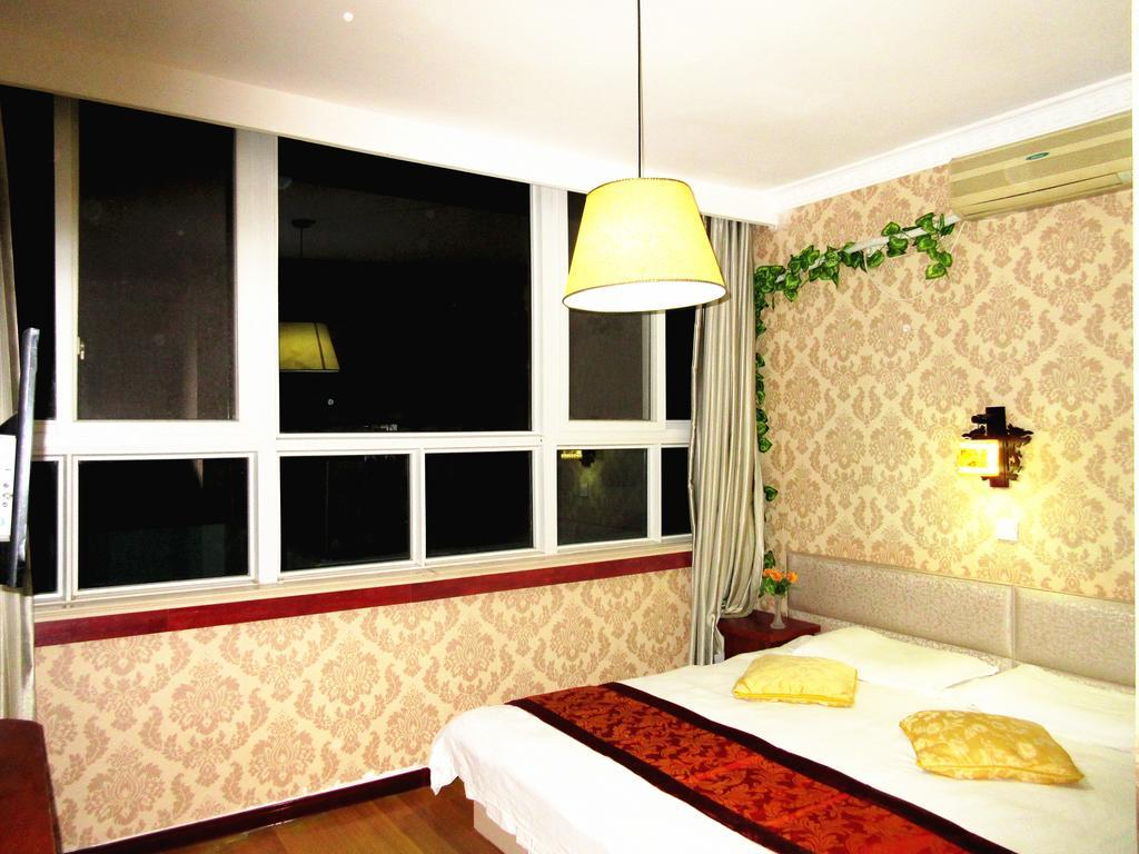 25°C Four Season Youth Hostel Циндао Номер фото