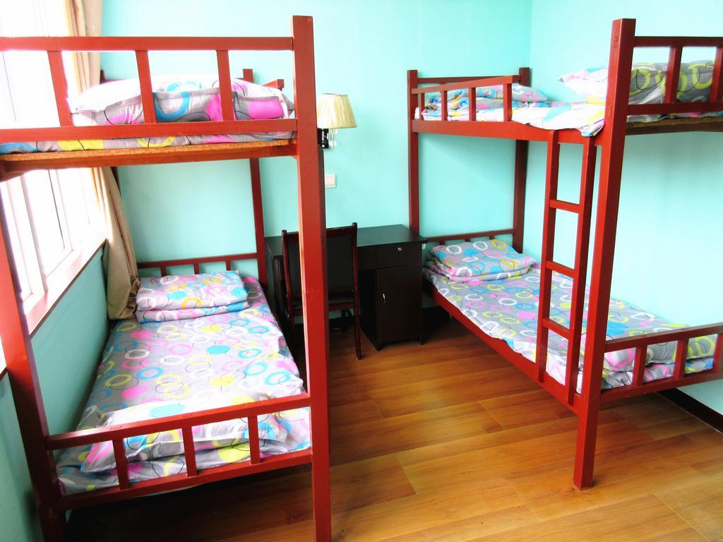 25°C Four Season Youth Hostel Циндао Номер фото