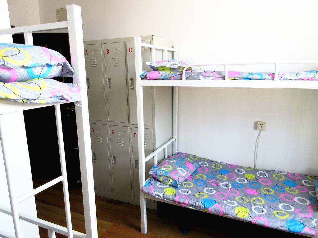 25°C Four Season Youth Hostel Циндао Номер фото