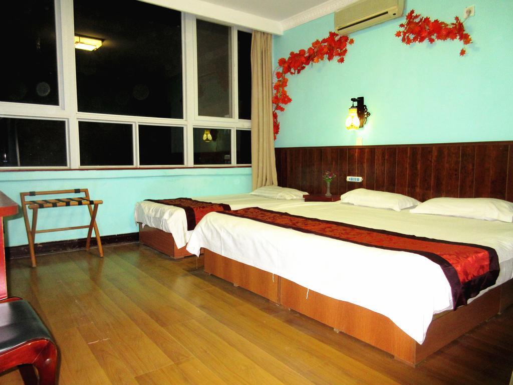 25°C Four Season Youth Hostel Циндао Экстерьер фото