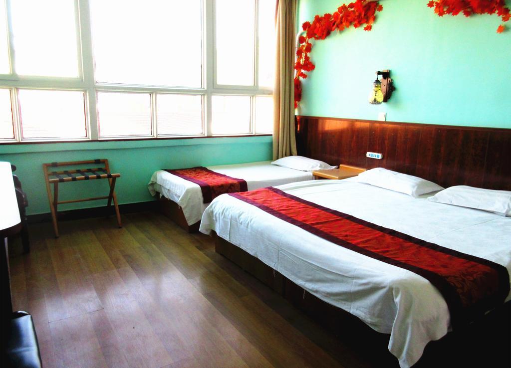 25°C Four Season Youth Hostel Циндао Экстерьер фото
