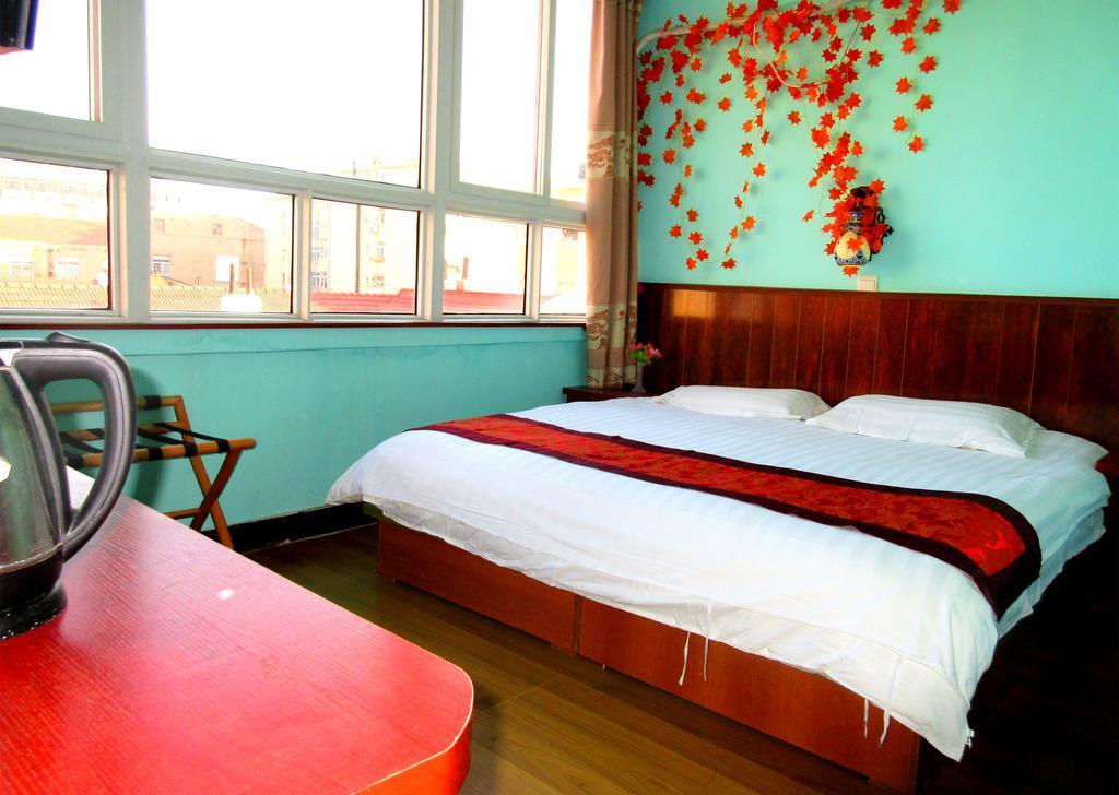 25°C Four Season Youth Hostel Циндао Экстерьер фото